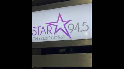 DJ Millennium pulling up to the Star 94.5 studios