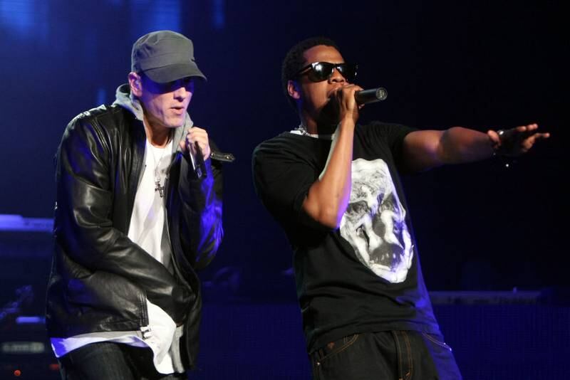 LOS ANGELES, CA - JUNE 01:  Rappers Jay-Z and Eminem perform together on-stage at the launch of 'DJ Hero' at the Wiltern Theatre on June 1, 2009 in Los Angeles, California.  (Photo by Kristian Dowling/Getty Images)