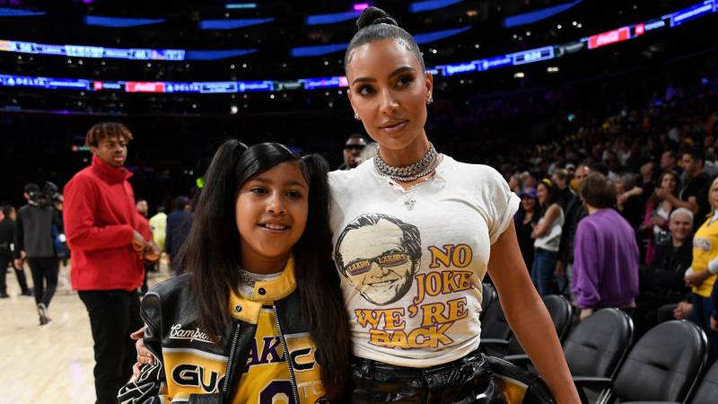 LOS ANGELES, CALIFORNIA - MAY 12: Kim Kardashian and daughter North West attend the Western Conference Semifinal Playoff game between the Los Angeles Lakers and Golden State Warriors at Crypto.com Arena on May 12, 2023 in Los Angeles, California. (Photo by Kevork Djansezian/Getty Images)
