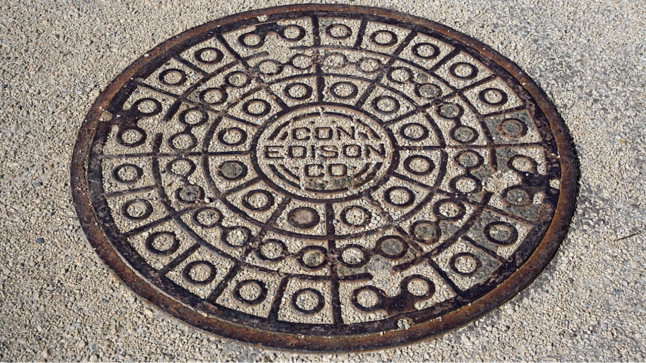 File photo. A woman died after falling into an open manhole on a busy Manhattan street on Monday night.