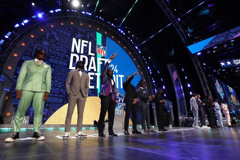 DETROIT, MICHIGAN - APRIL 25: The top prospects pose on stage prior to the first round of the 2024 NFL Draft at Campus Martius Park and Hart Plaza on April 25, 2024 in Detroit, Michigan. (Photo by Gregory Shamus/Getty Images)